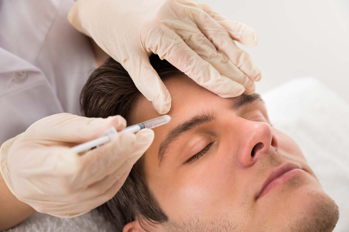 Man Having Botox Treatment Man Having Botox Treatment